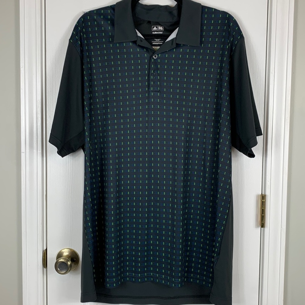 Adidas climacool black short sleeved golf polo with a green design. Size XL.